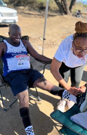 Athlete receiving post-race support